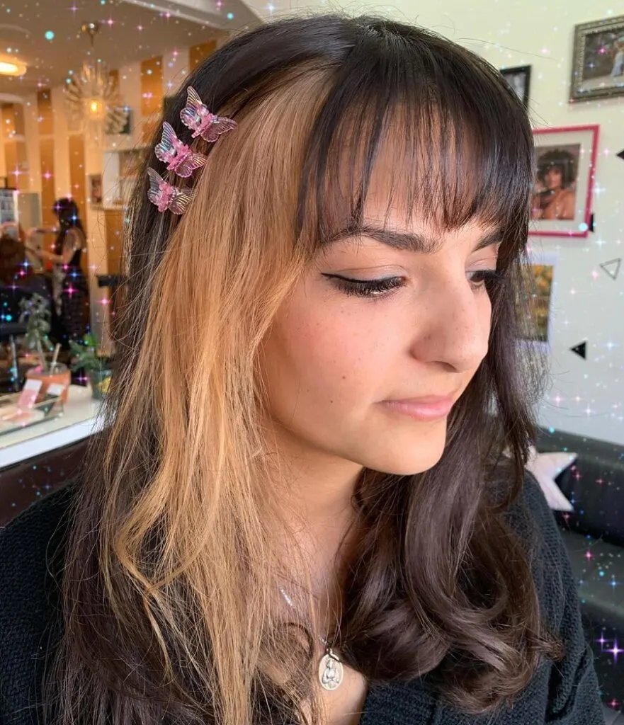 butterfly clip hairstyle with bangs