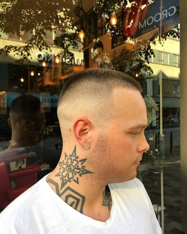 buzzed mohawk with bald fade