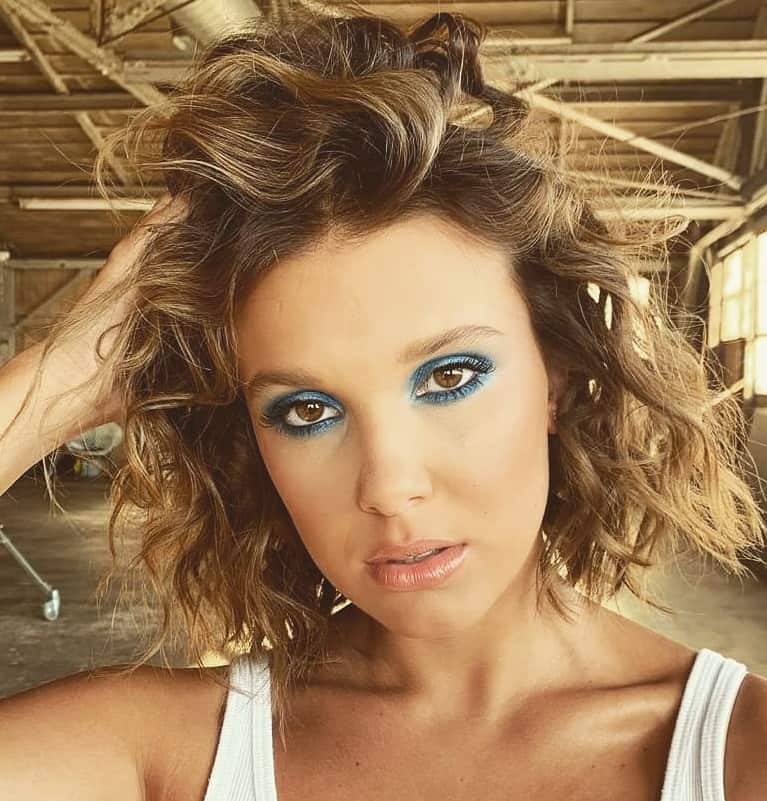 celebrity with short curly hair - Millie Bobby Brown
