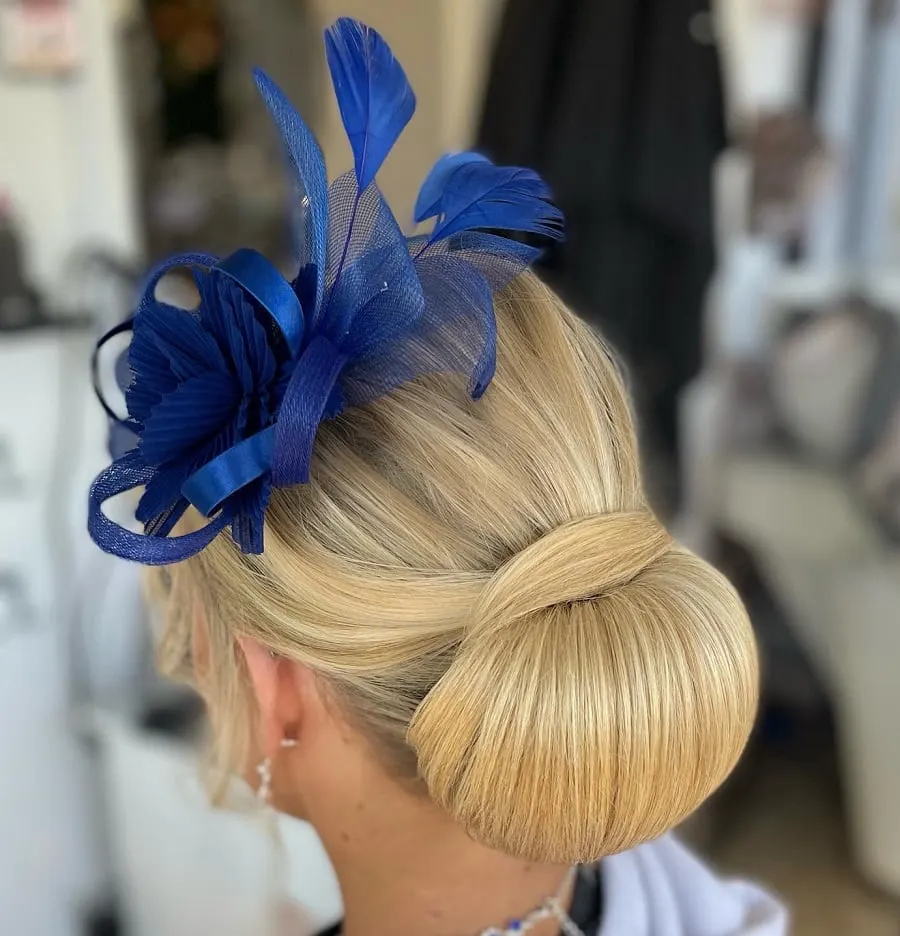 chignon bun hairstyle for wedding guest over 50