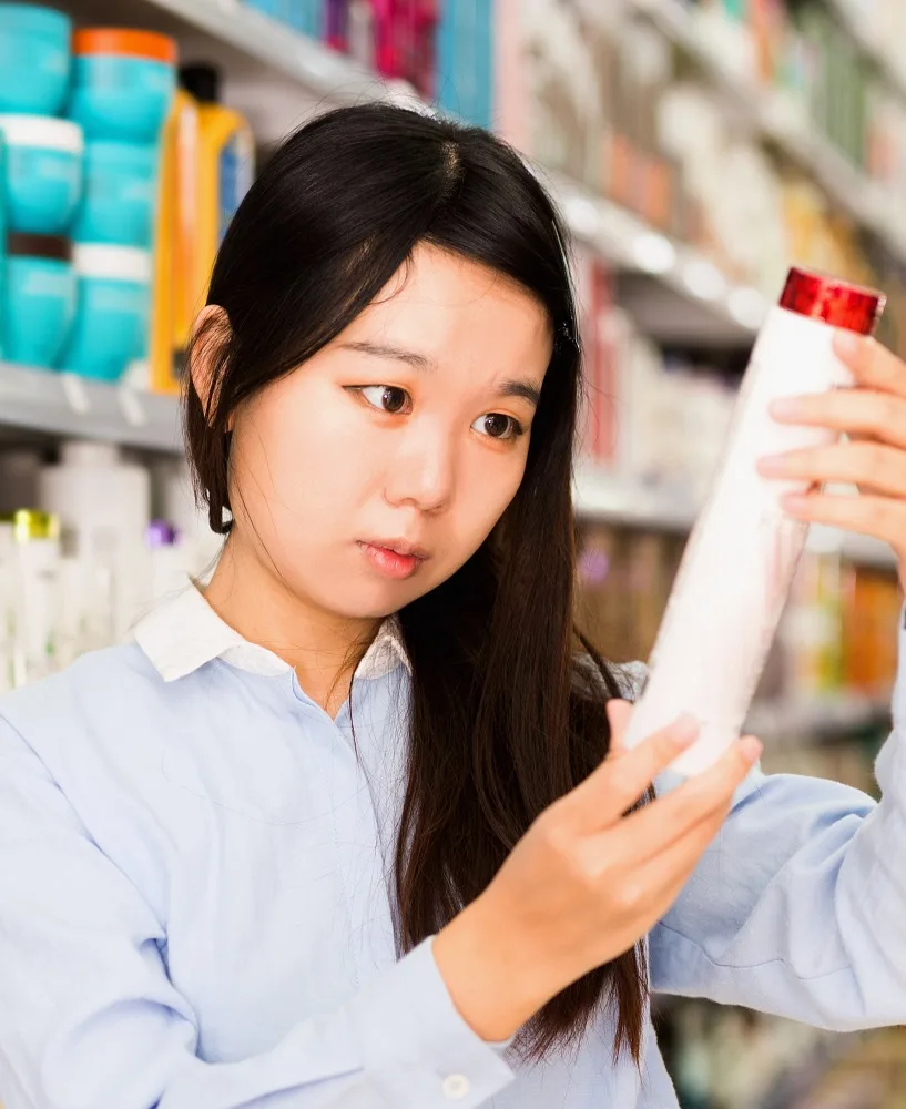 girl choosing right color depositing shampoo