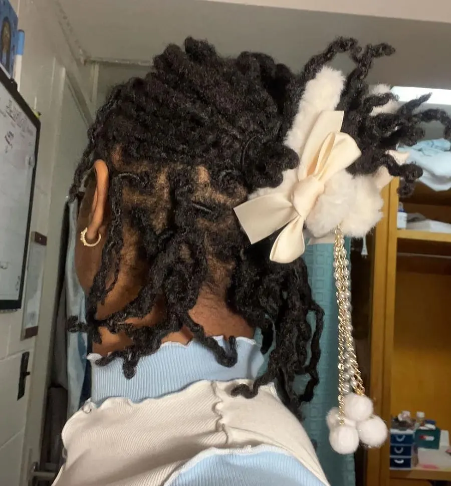 claw clip hairstyle with dreadlocks