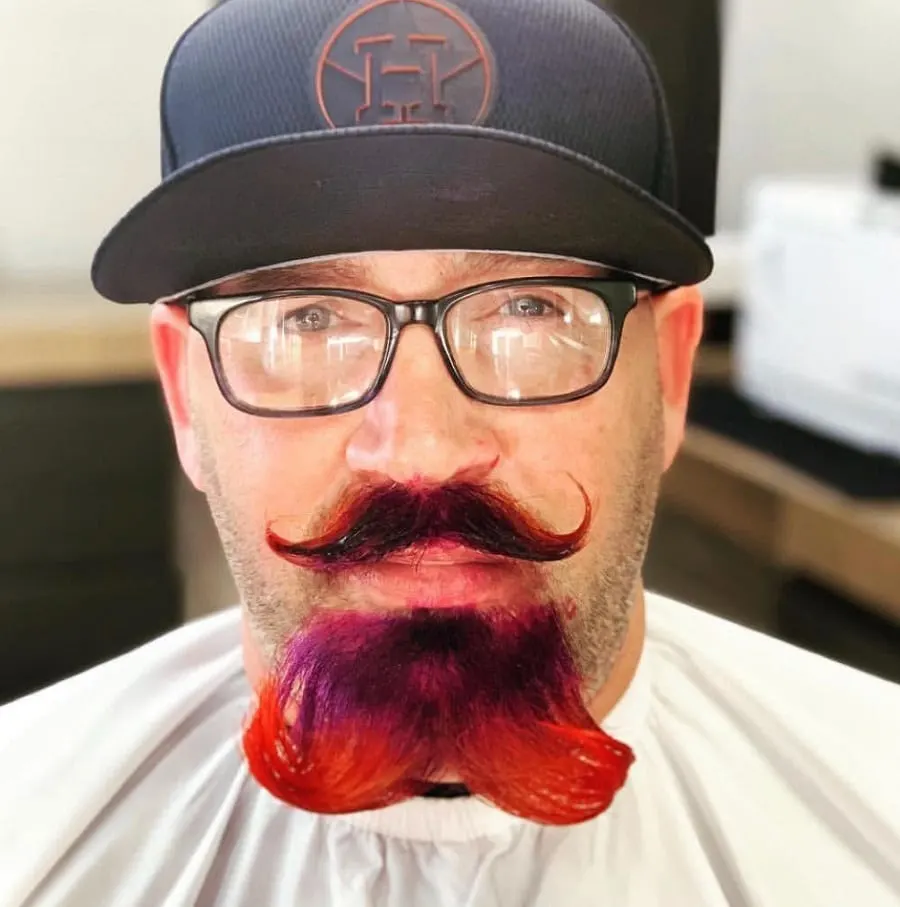 colored handlebar mustache with goatee beard