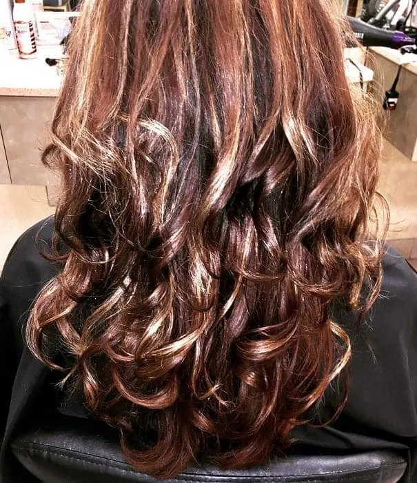 curly copper brown hair with highlights