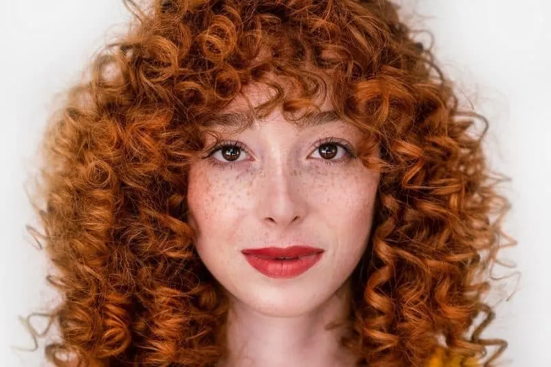 copper red curly hair