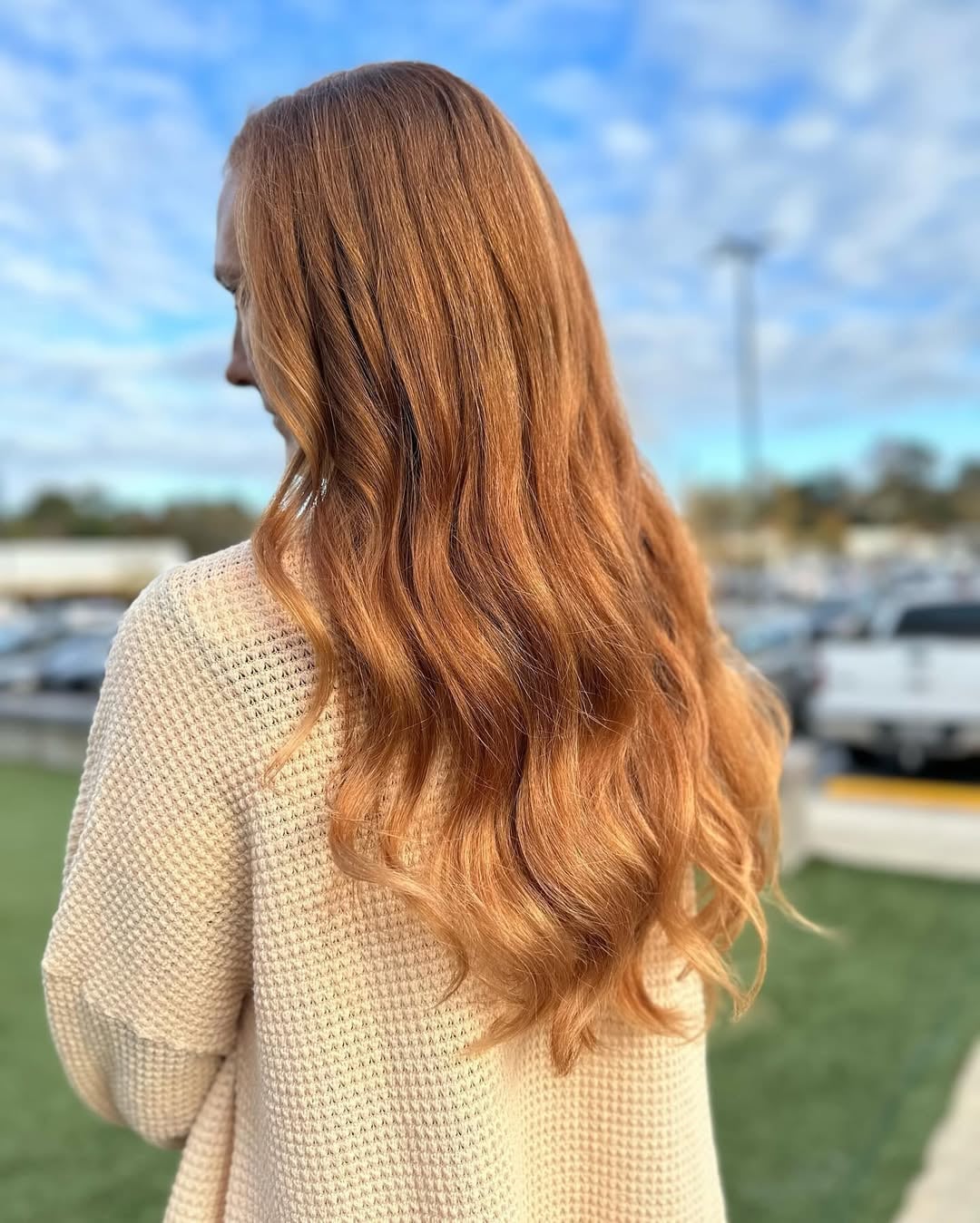 long wavy copper red to strawberry blonde hair color