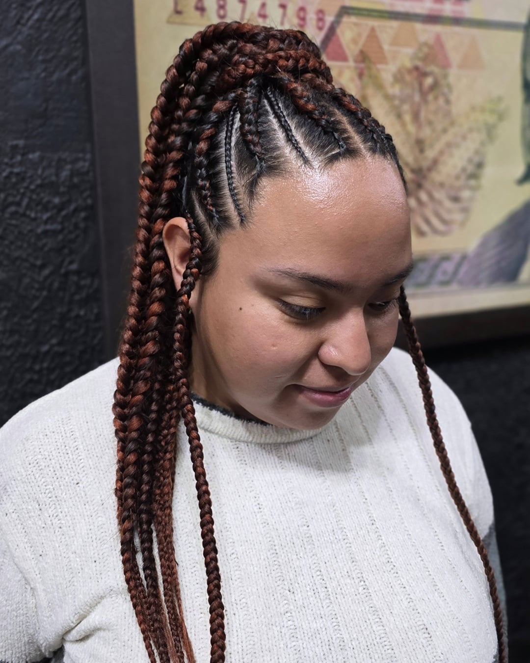high ponytail cornrow braids with auburn copper highlights