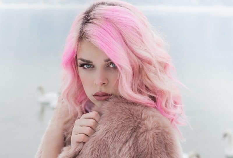 cotton candy pink hair with dark roots