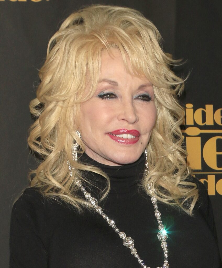 country singer Dolly Parton with blonde hair