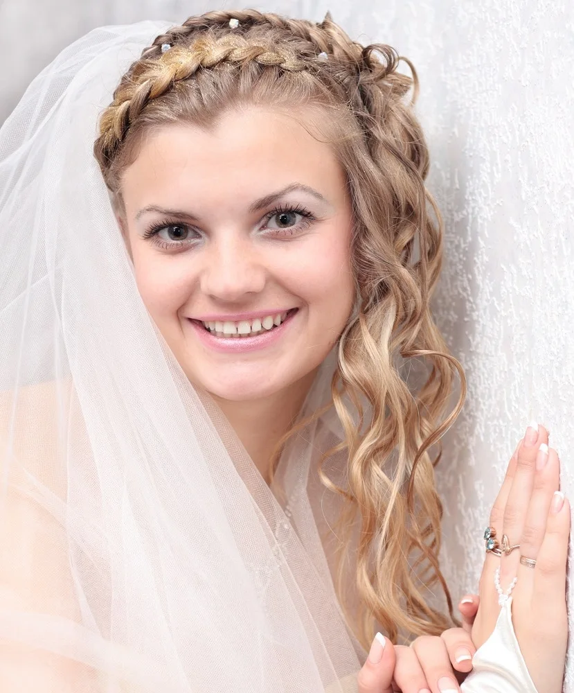 country wedding hairstyle with braids and waves