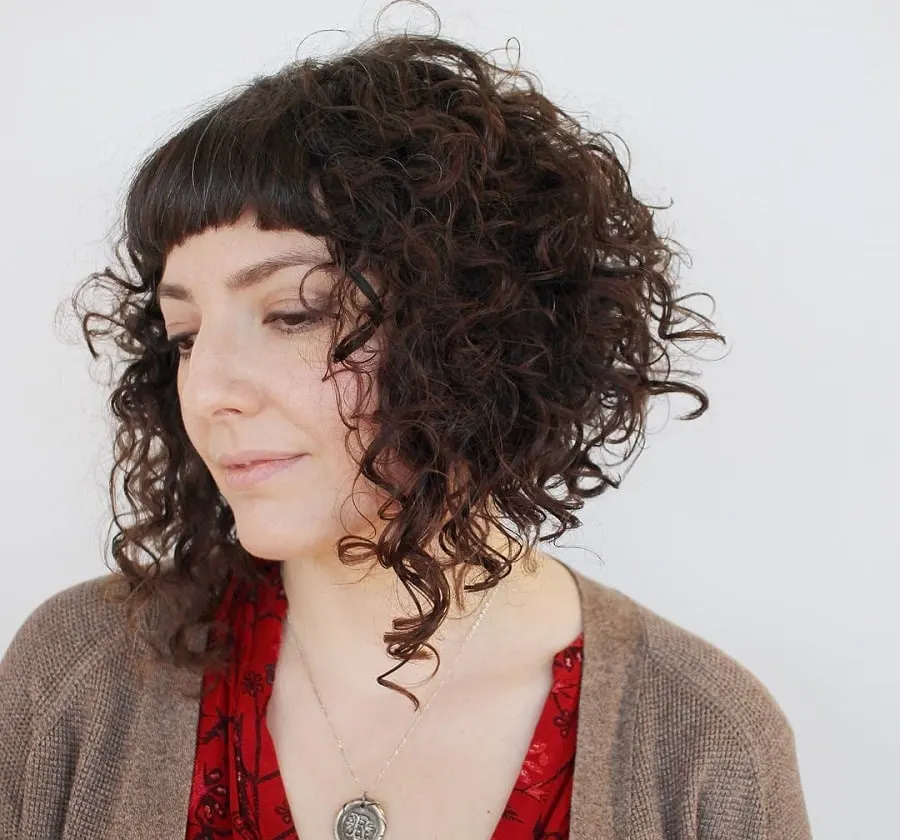 curly a-line bob with straight bangs