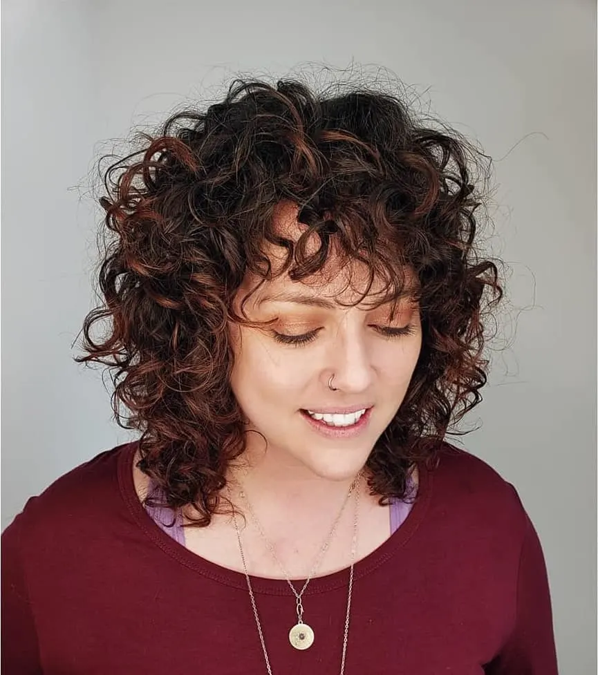curly angled bob with bangs
