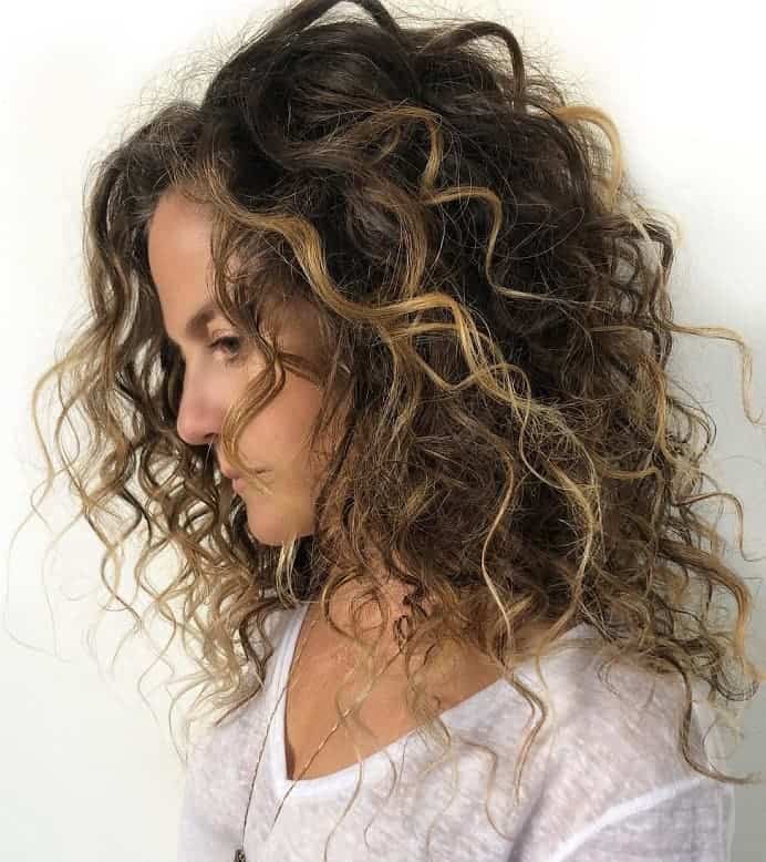 medium length balayage curly hair