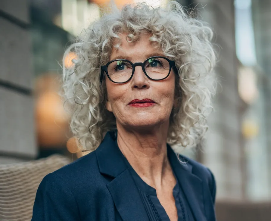 curly bangs for over 60 with glasses
