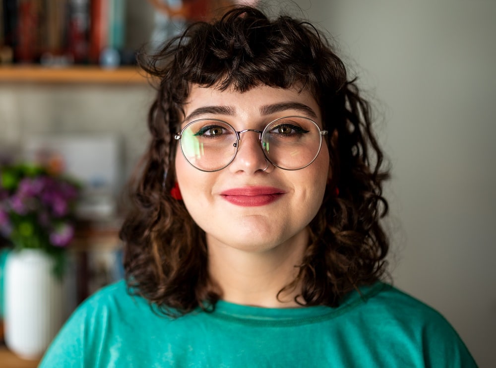 curly bangs for round faces with glasses