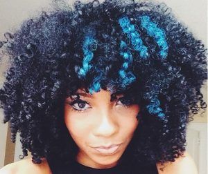 curly black hair with blue tips
