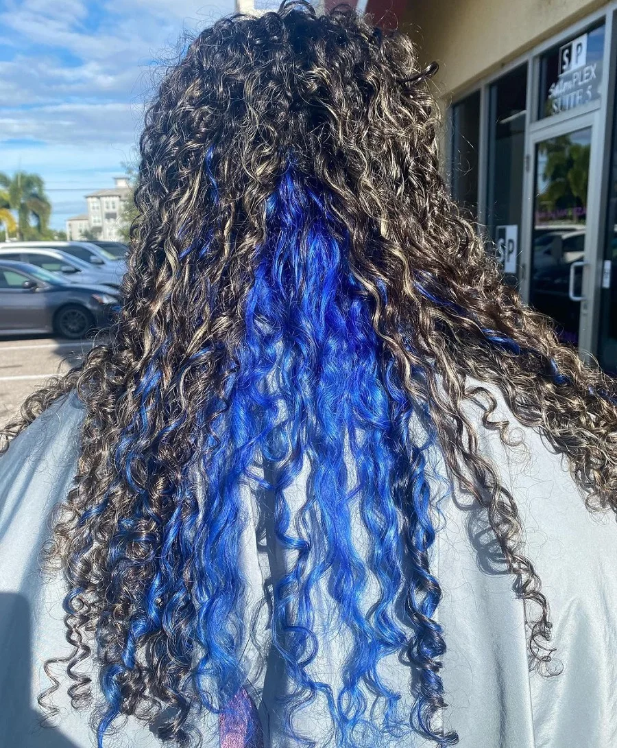 curly black hair with blue underneath