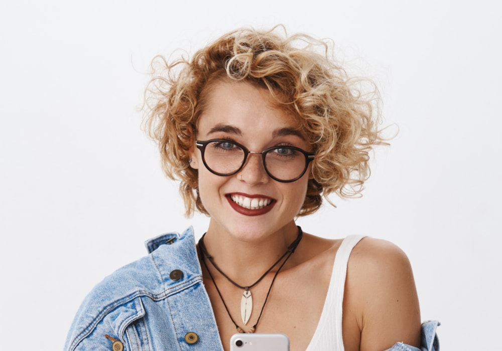 curly bob for oval face with glasses
