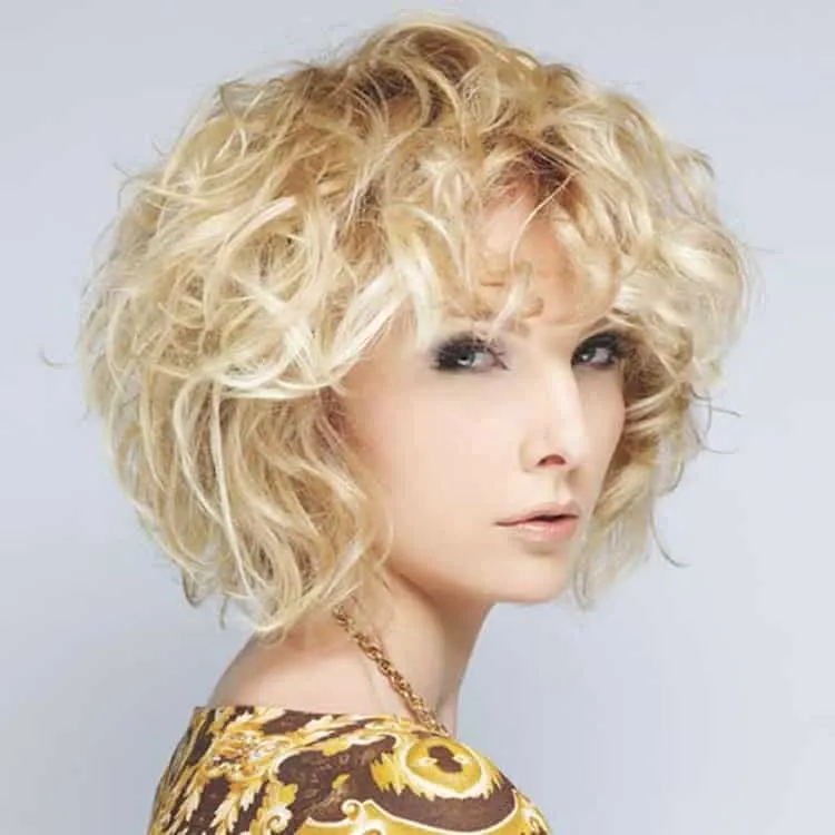 blonde curly bob with bangs