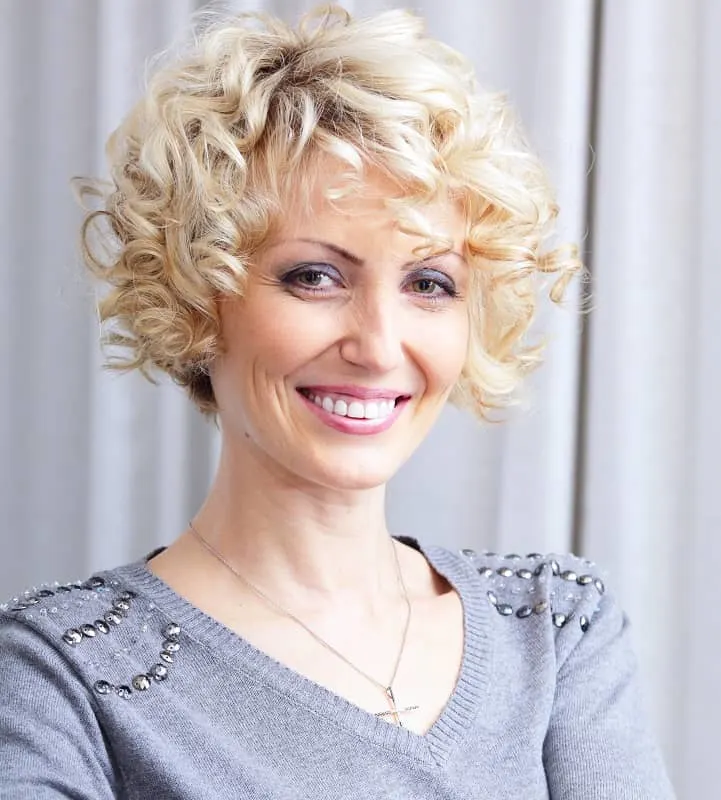 curly bob with bangs for older women