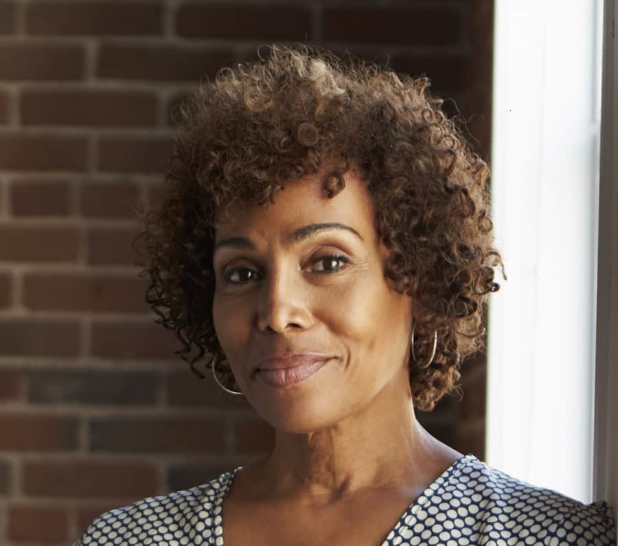 curly bob with bangs for women over 50
