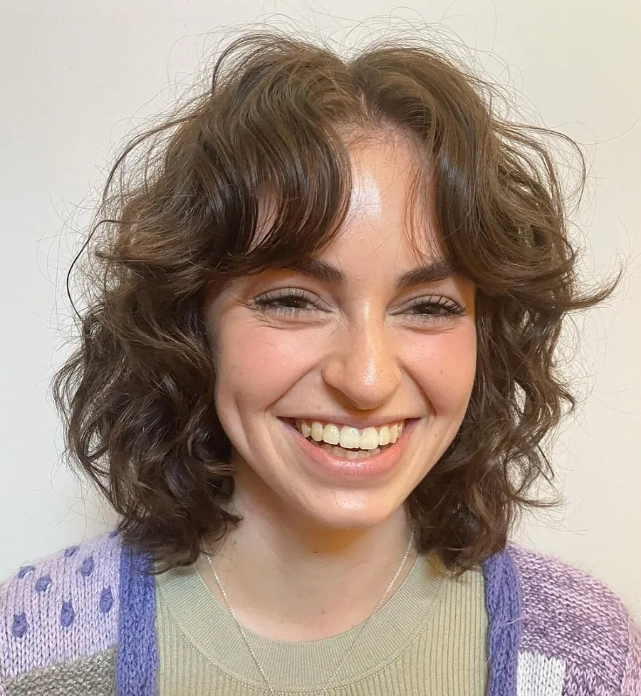 curly bob with curtain bangs for big forehead