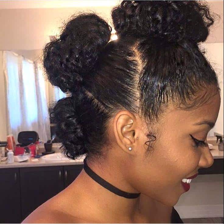20 Amazing Curly Bun Hairstyles to Stand Out (2023 trends)