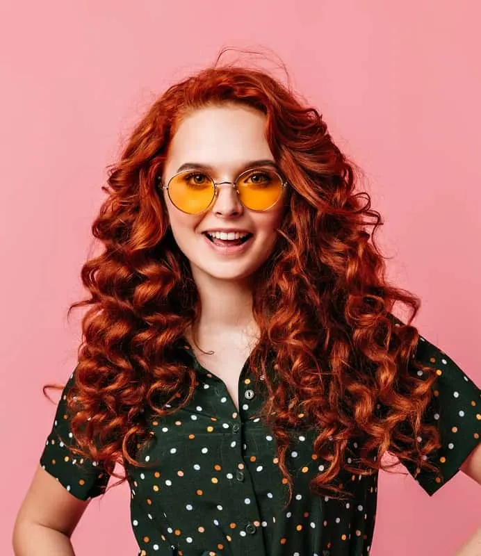 curly copper red hairstyle