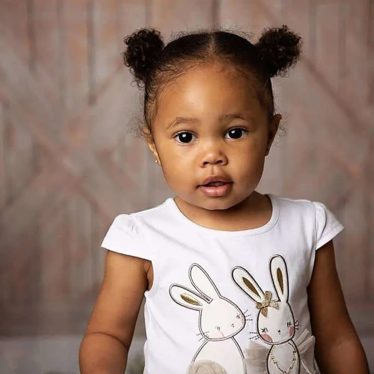 curly space buns for baby girl