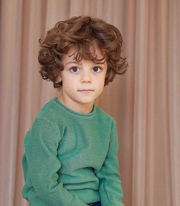 little boys with long curly hair