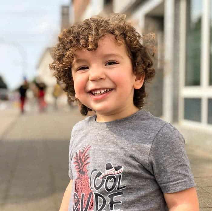 bouncy curly hairstyle for little boys