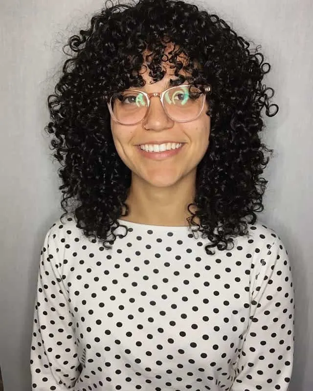 Curly hair with bangs and glasses