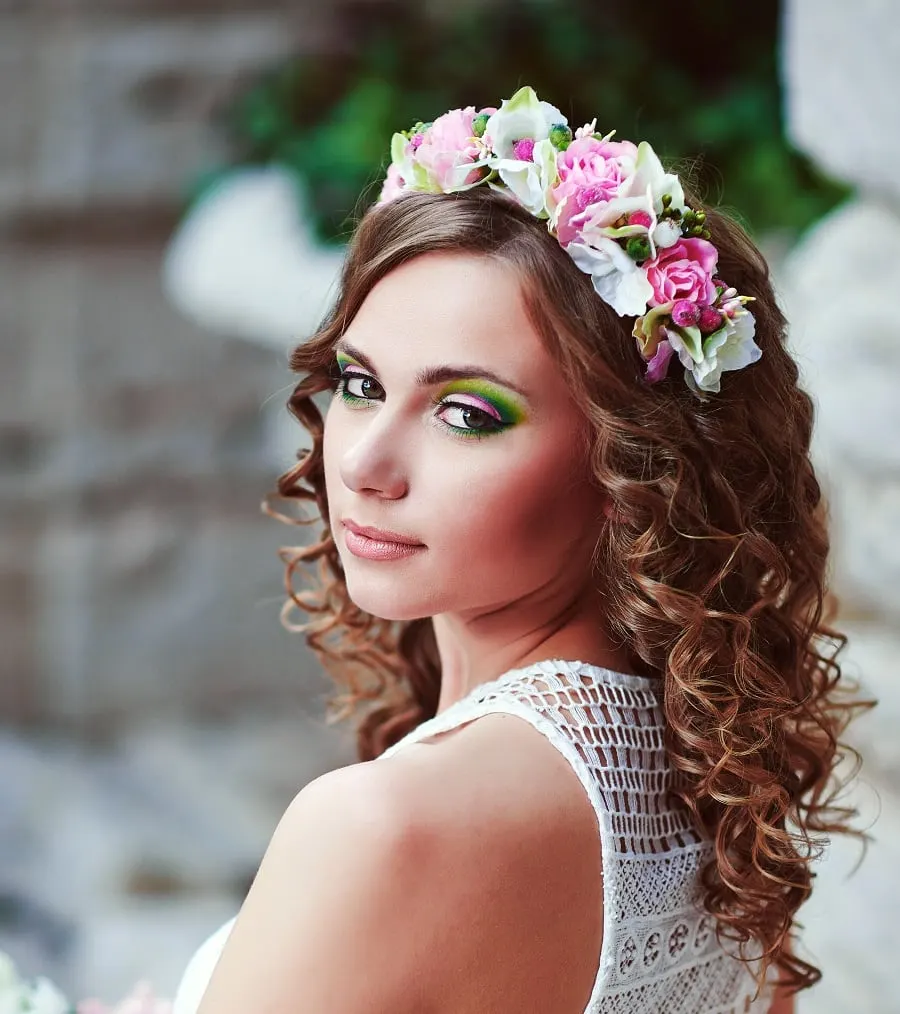 curly hairstyle with flowers for wedding