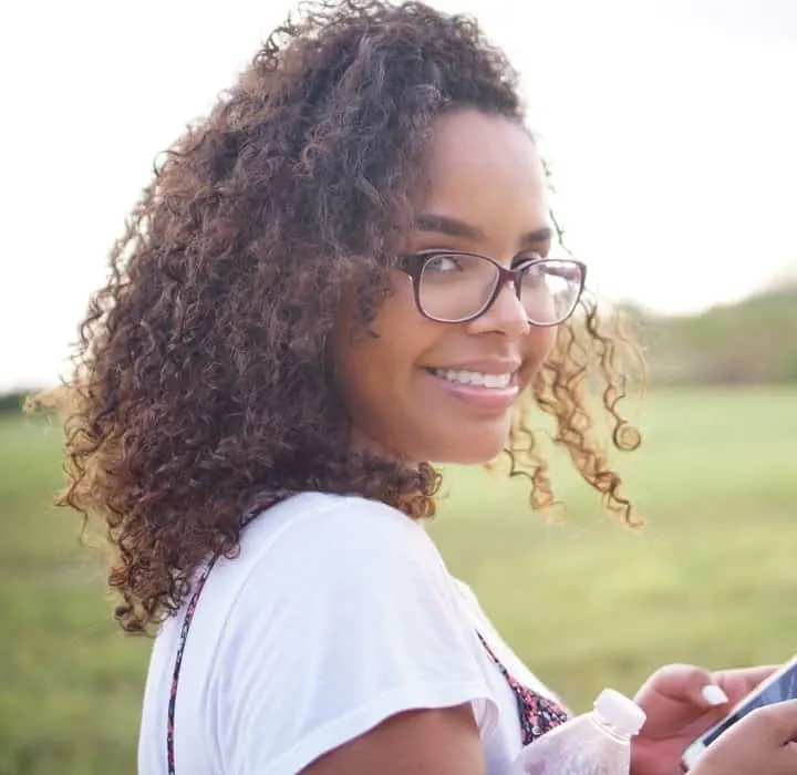 Curly hairstyle with glasses