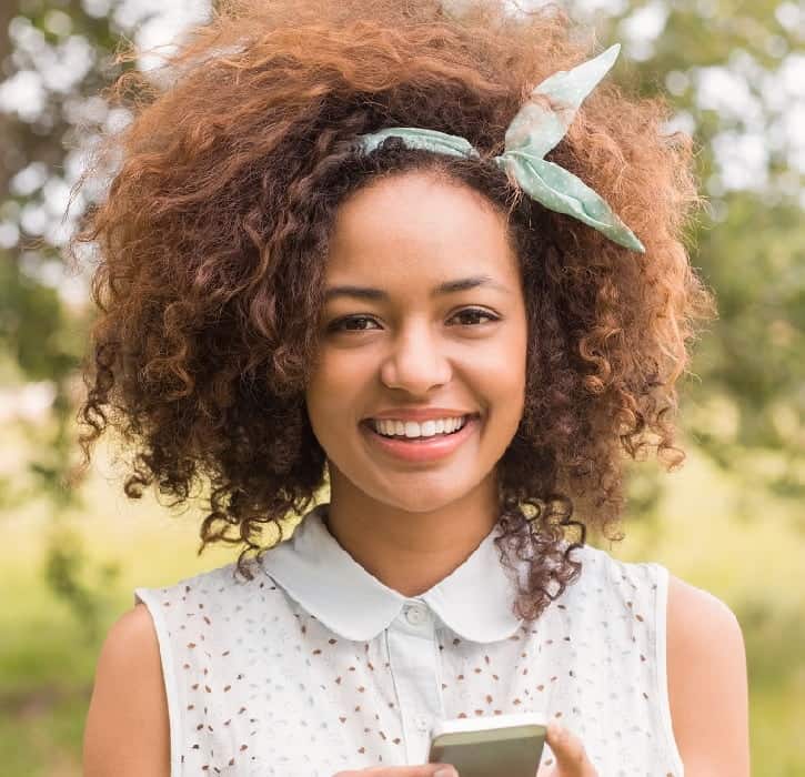 curly hairstyle with headband