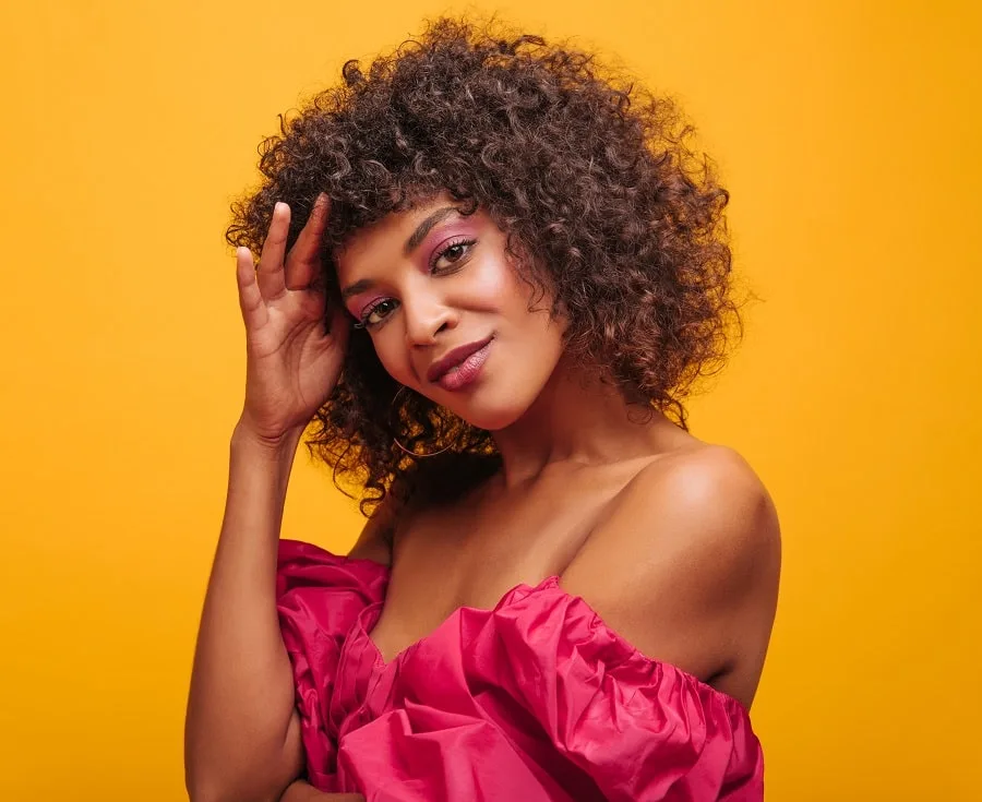 curly hairstyle with off shoulder dress