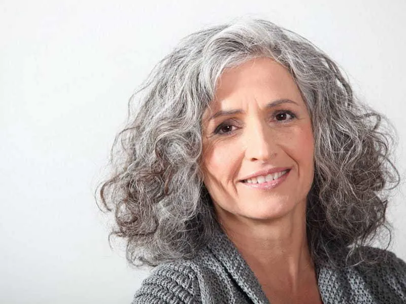 medium curly hair for women over 50