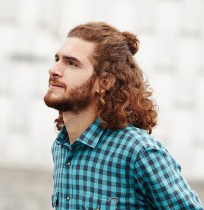 23 Refreshing Curly Man Bun Hairstyles For 2024   Curly Half Up Man Bun 291x300 