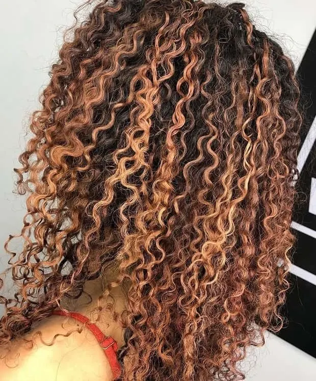 copper highlights on curly hair