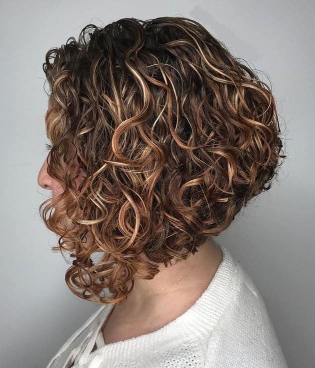 curly inverted bob with highlights