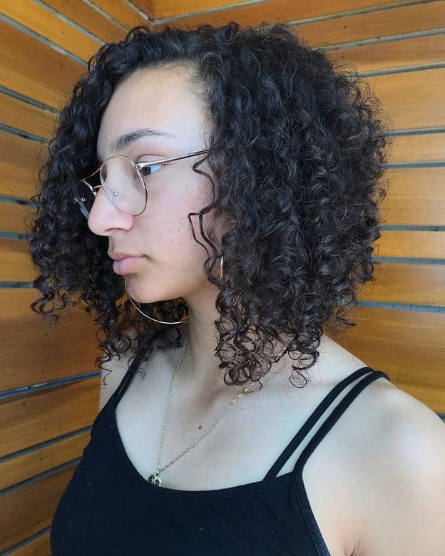 curly inverted bob with side part