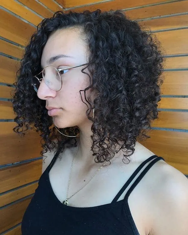 curly inverted bob with side part