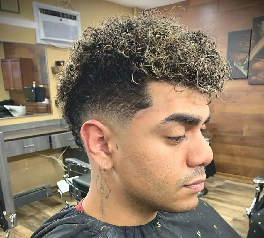 curly mohawk with low skin fade