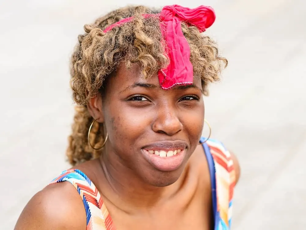 curly ponytail with bangs for black women