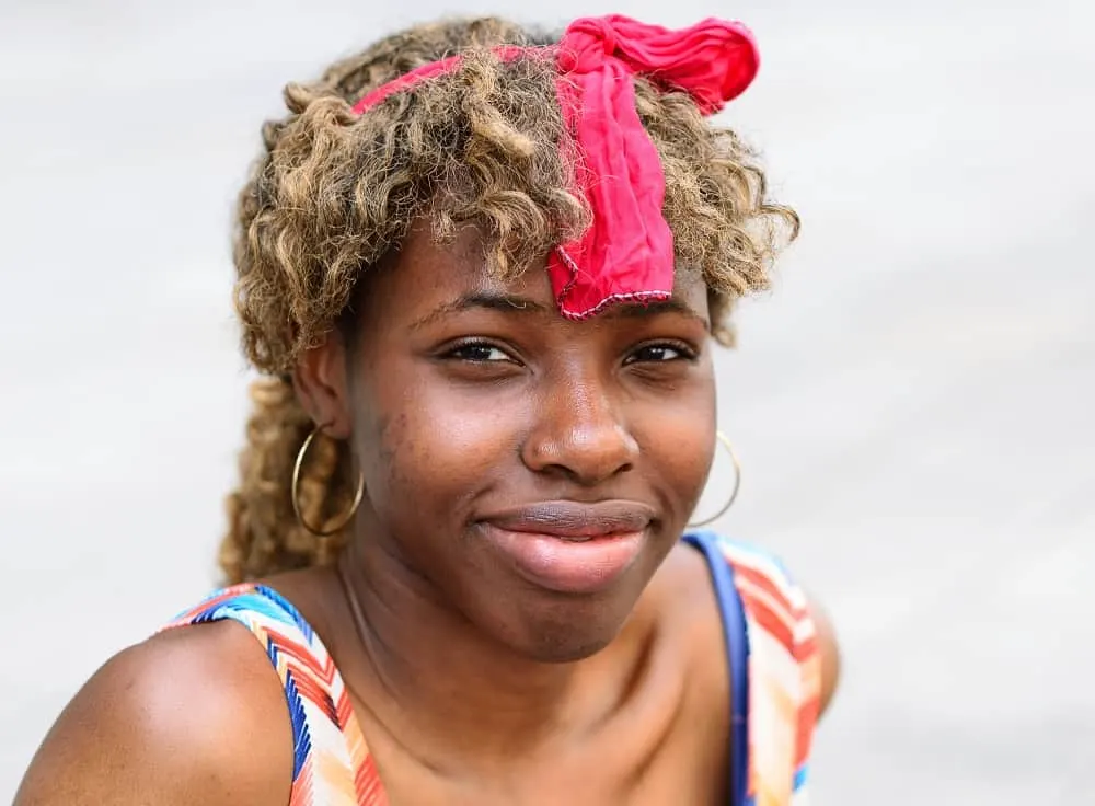 curly ponytail with bangs for black women