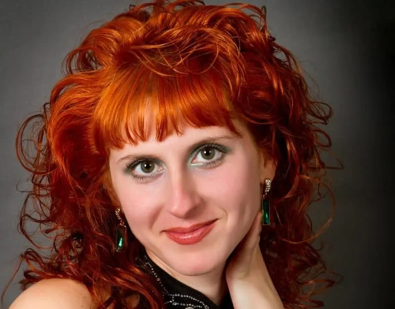 curly red hair with bangs