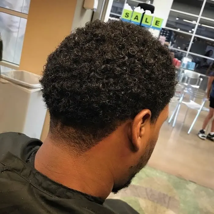 short curls with taper fade