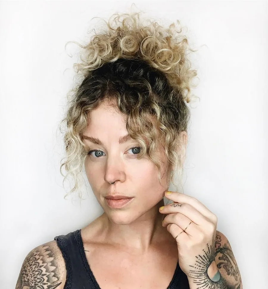 curly updo with curtain bangs