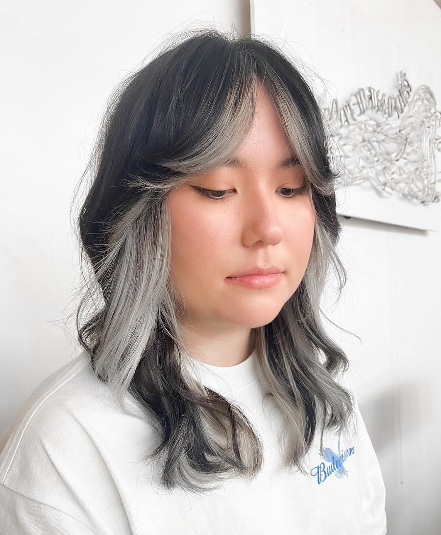 Curtain bangs with wavy hair for Asian women