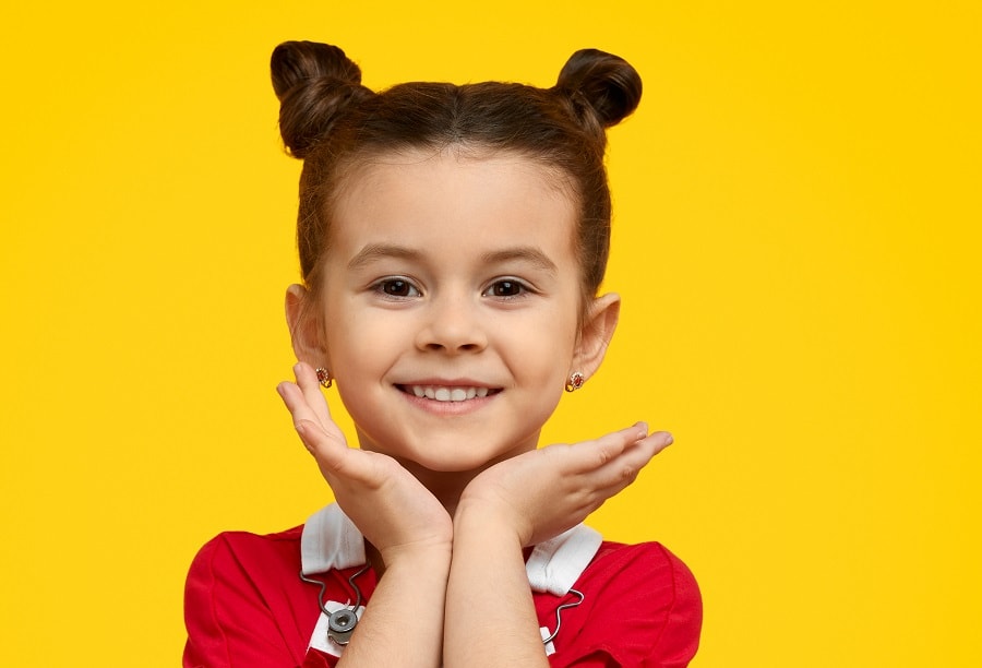 cute space buns hairstyle for picture day
